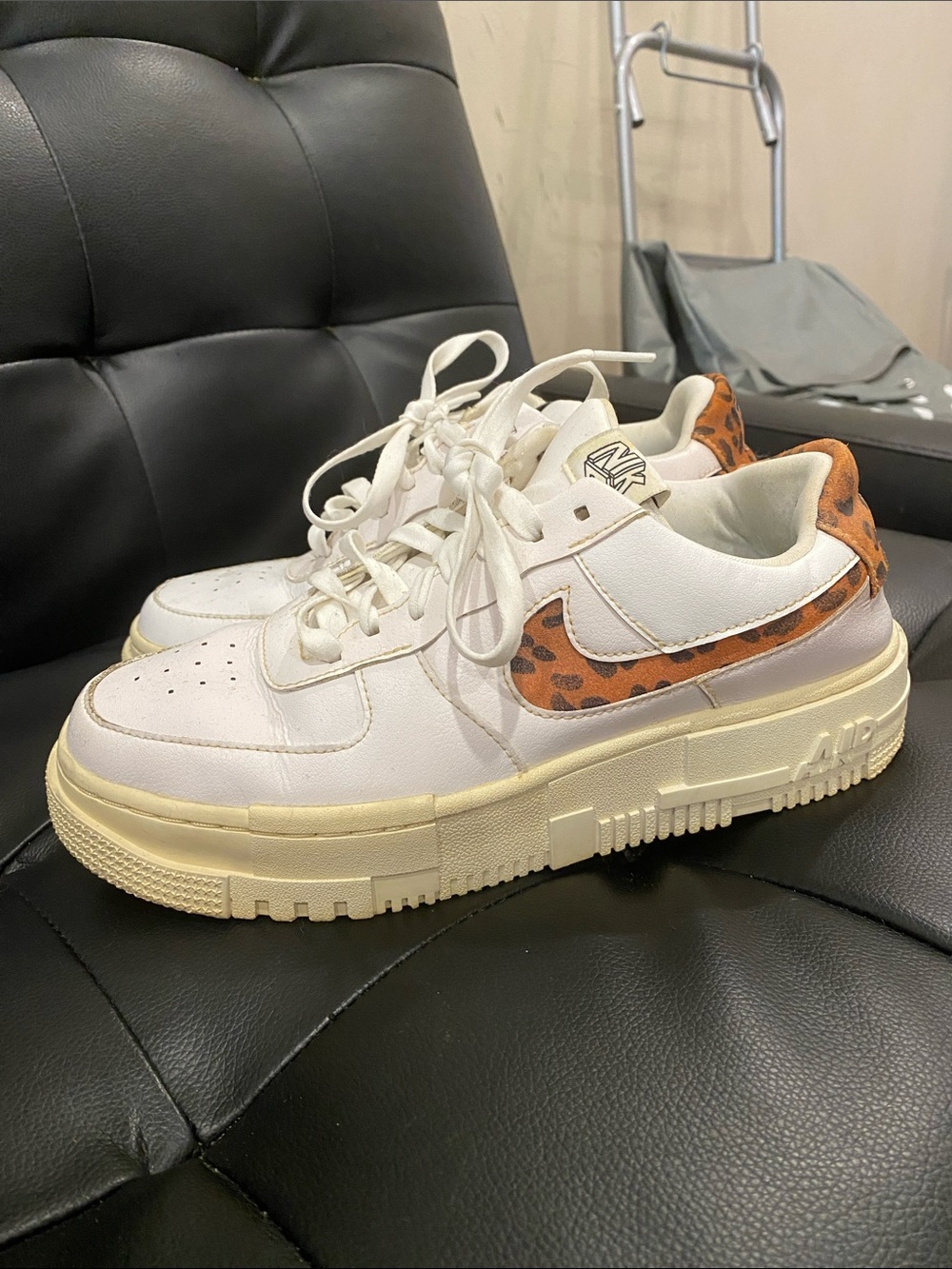 Nike Low-Top Sneakers with White & Orange Leopard Swoosh